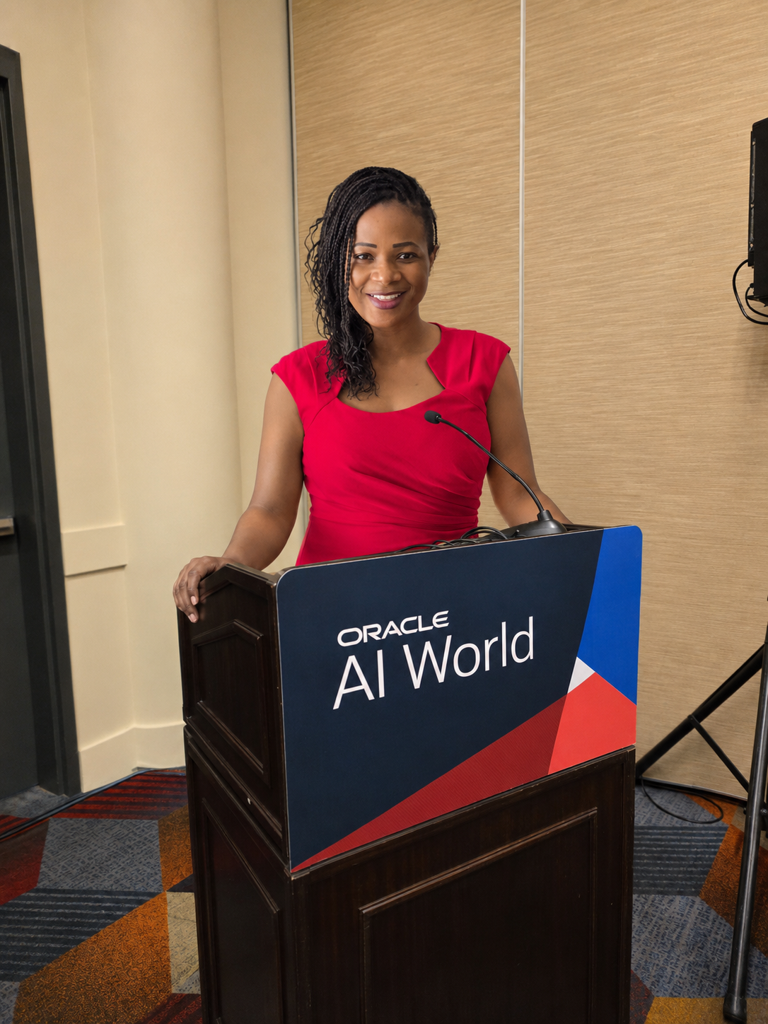 Dr. Ley Sylvester speaking at Oracle AI World 2025